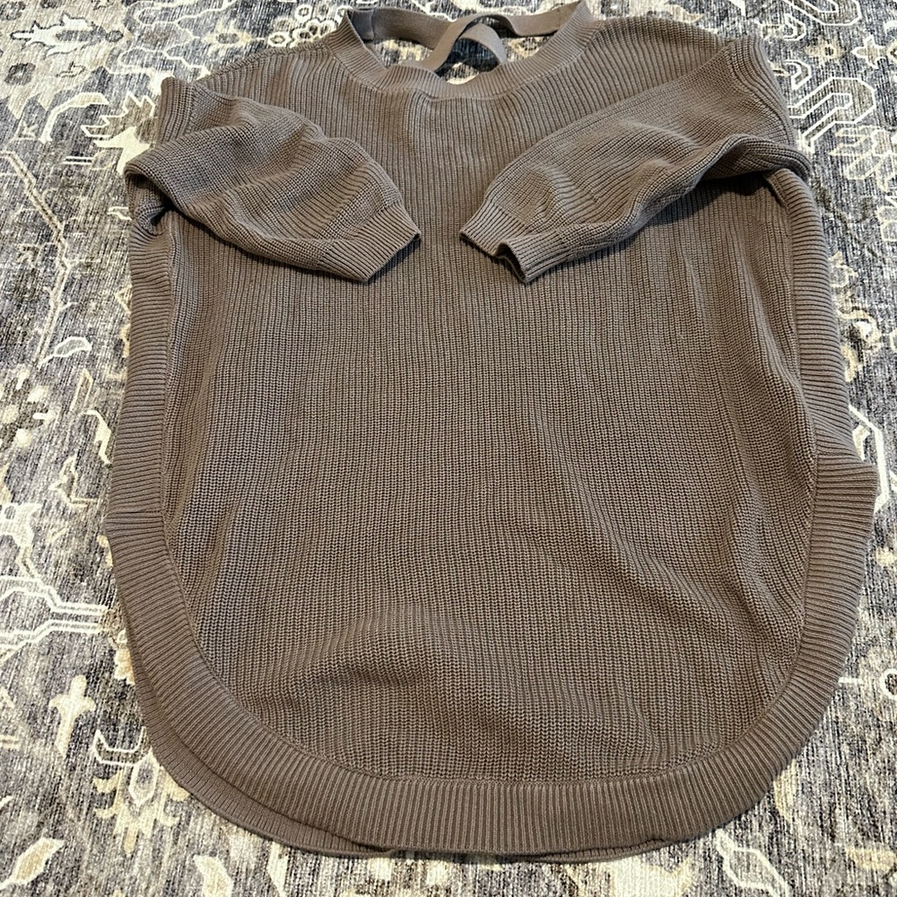 Express sweater with criss-cross back detail.